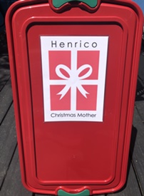 Book collection bin with Henrico Christmas Mother logo.