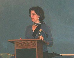 Kim Sicola, Curator, speaking.