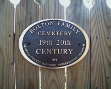 Plaque identifying Bolton family cemetery that was restored by Sylvia Hoehns Wright, a Bolton family member.