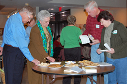 A taste of history:  Members sample refreshments made by the Friends of Meadow Farm according to historic recipes.  Dishes included Jumbles and Mrs. Robert E. Lee's gingerbread.
