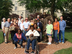 HCHS members gathered around the statue of Lincoln and the horse he rode on the three mile ride between the Lincoln Cottage and the White House.
