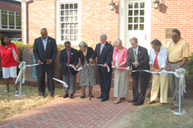 The ribbon is cut to reopen the Museum in Memory of Virginia Randolph.