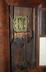 Ogee clock works and weights.