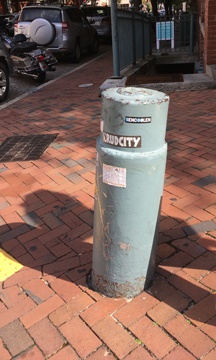 Cannon repurposed as bollard at northwest corner of East Cary Street and Thirteenth.