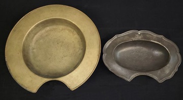 Two different kinds of bowls used by barbers.