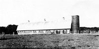 Curles Neck barns, circa 1930, in Varina District, Henrico County, Virginia.